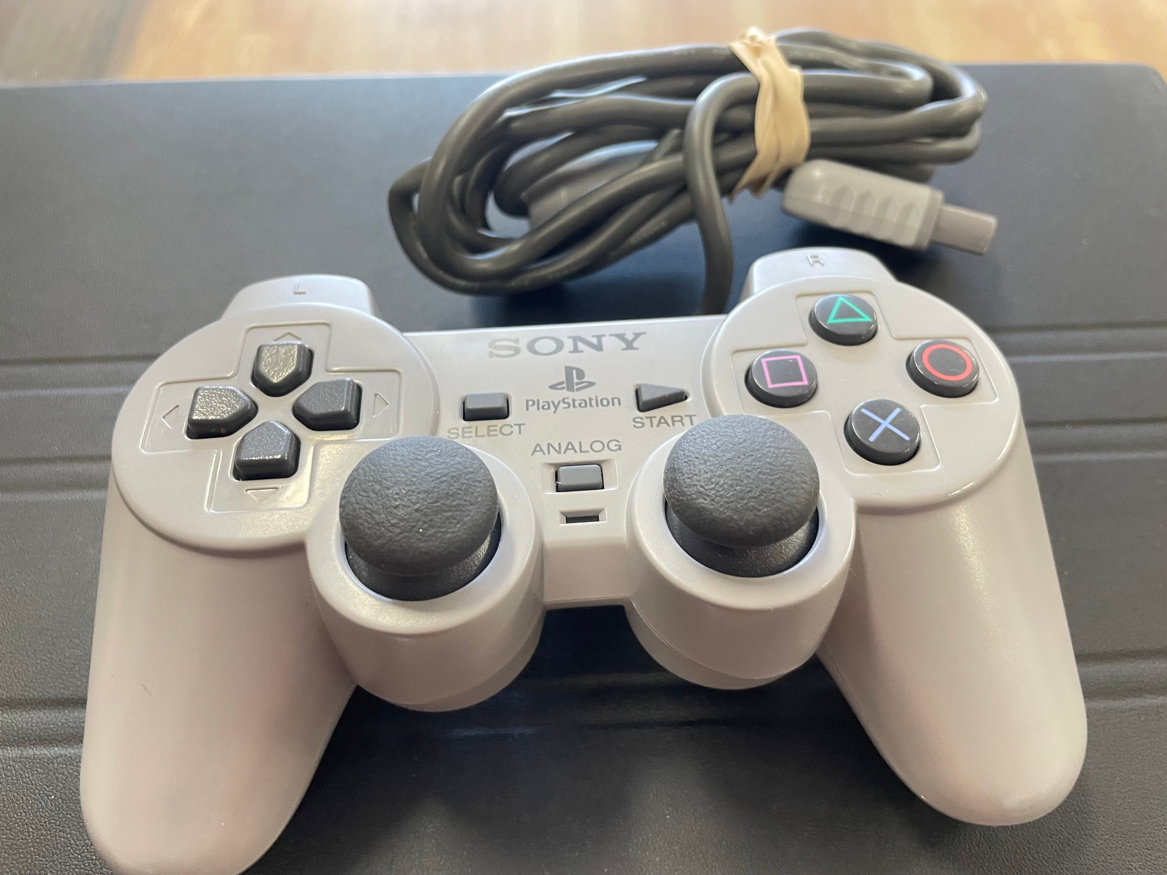 PlayStation 1 gray/ Black controller